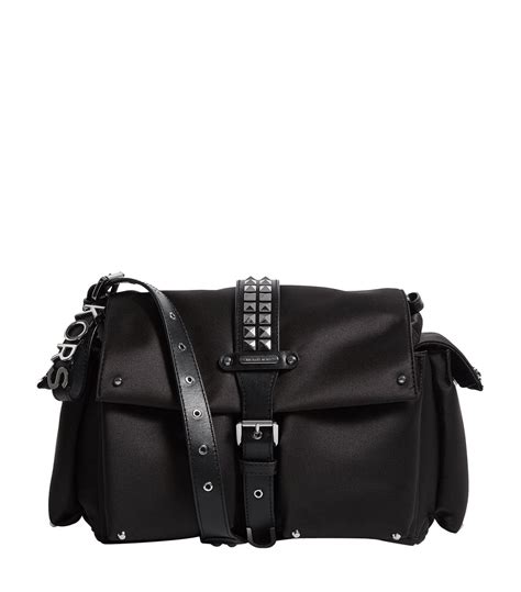 michael kors trunk bag black|Michael Kors black studded bag.